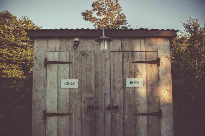 Illustration showcasing Insta Toilets in remote areas, highlighting features like self-contained waste systems, waterless operation, durability, and eco-friendly designs.
