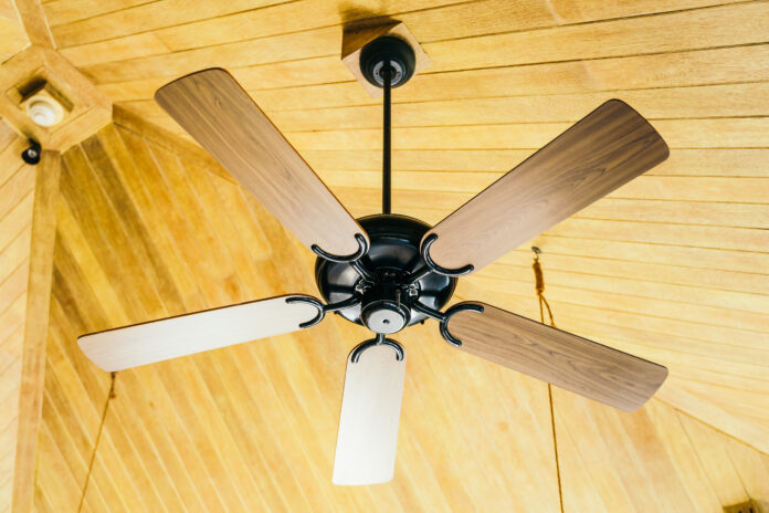 Attic fan installed in a home, promoting better ventilation and temperature control for enhanced energy efficiency and comfort.