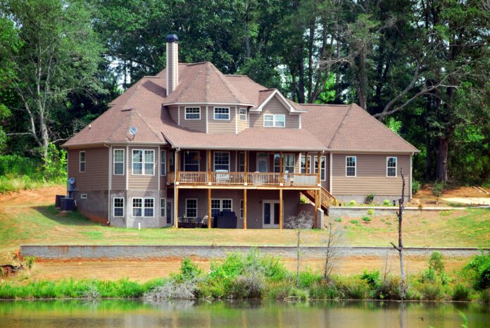 Beautiful home with modern siding that enhances curb appeal and increases property value.
